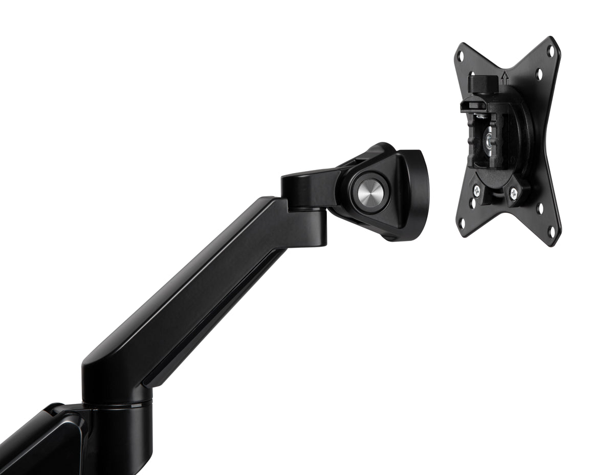 Black monitor arm with the VESA mounting plate visible at the end