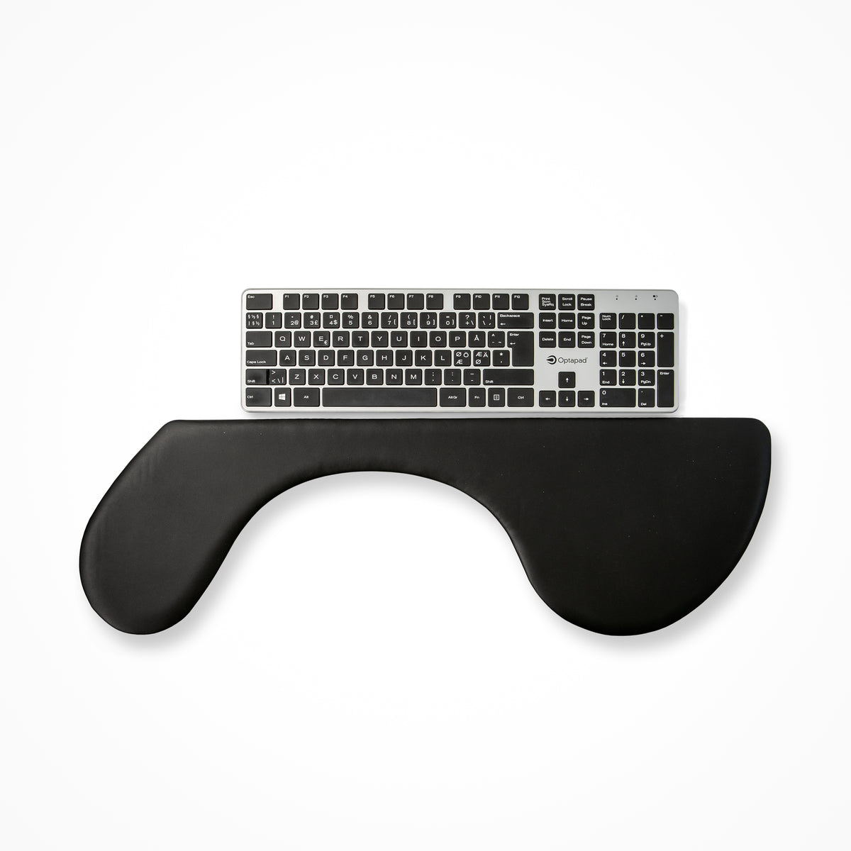Arm support Pro Ultra Slim positioned in front of a keyboard