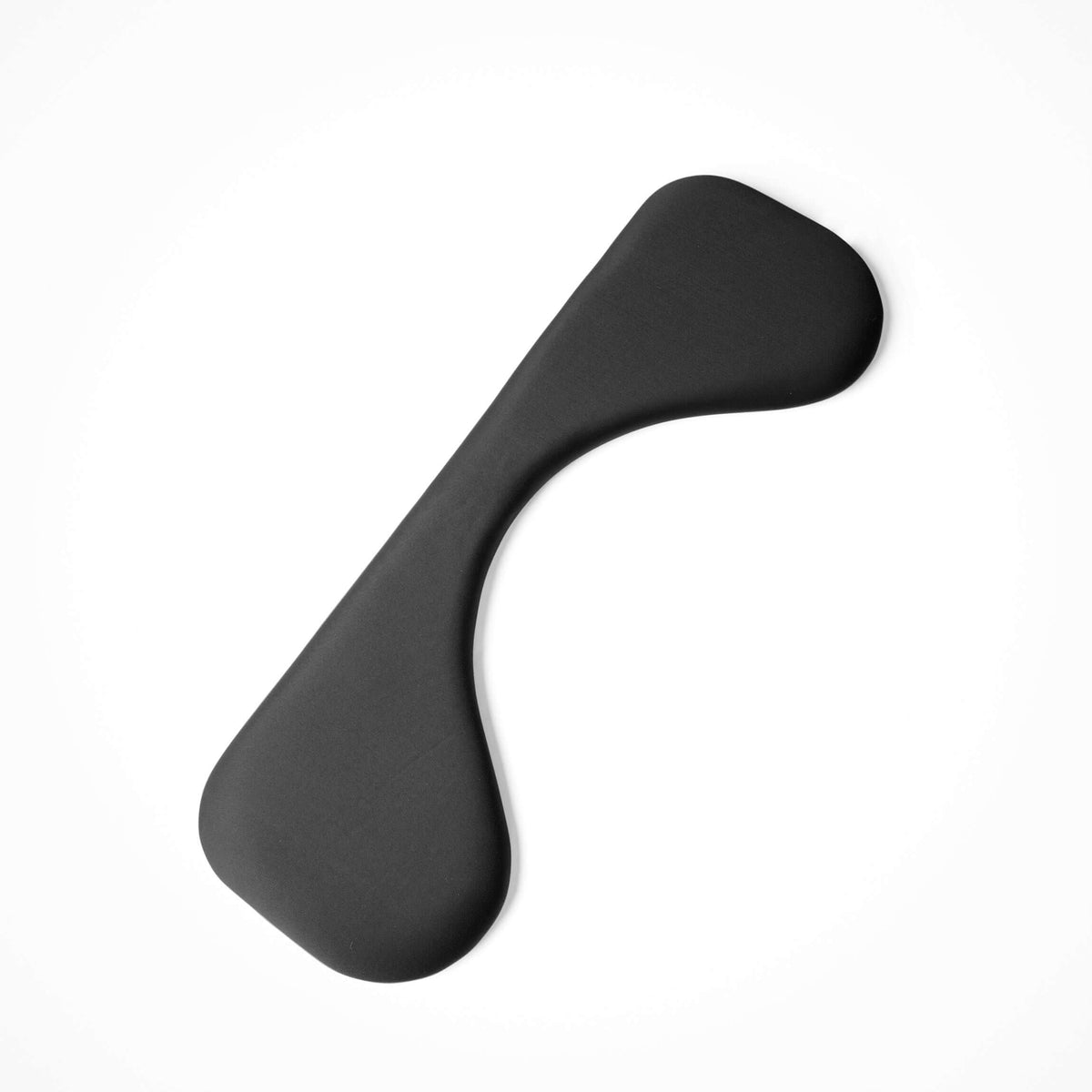 Arm support symmetric viewed at an angle, showing the contoured pad