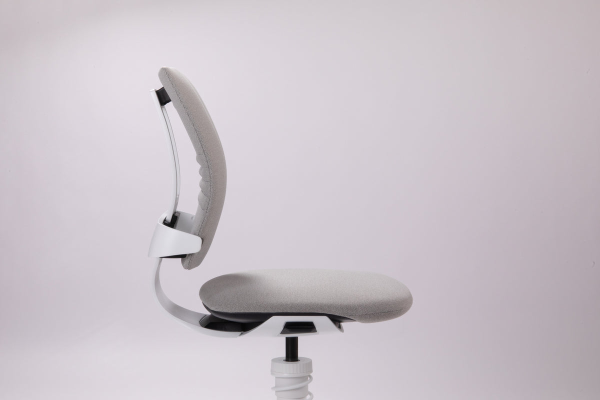 3Dee active chair with white frame and light grey seat against a pale pink background