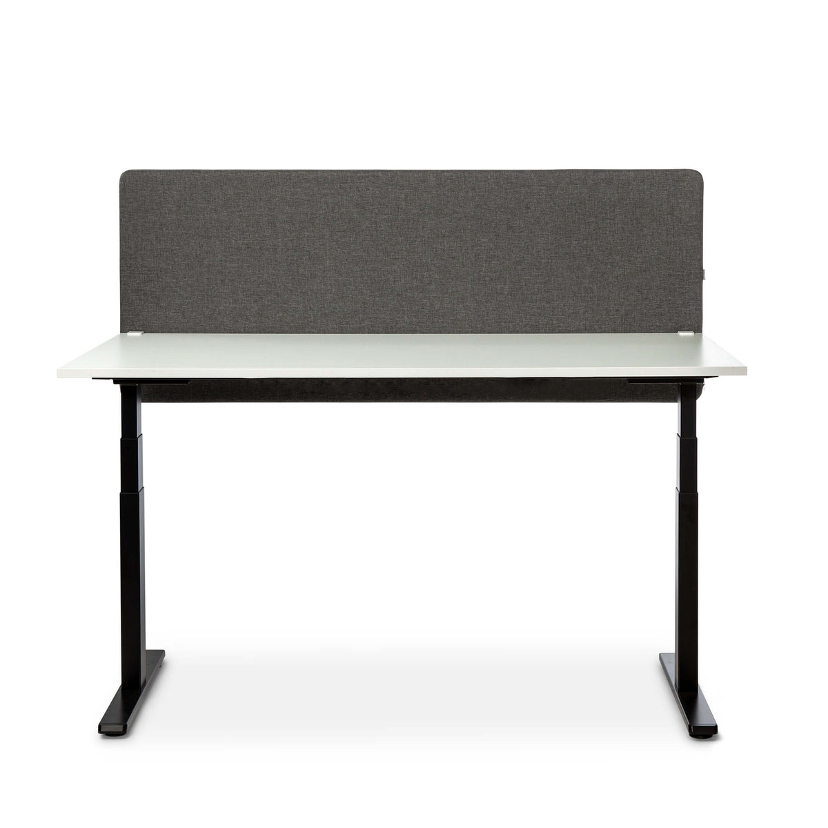 White desk with a grey MUTE acoustic screen along the back, seen from the front