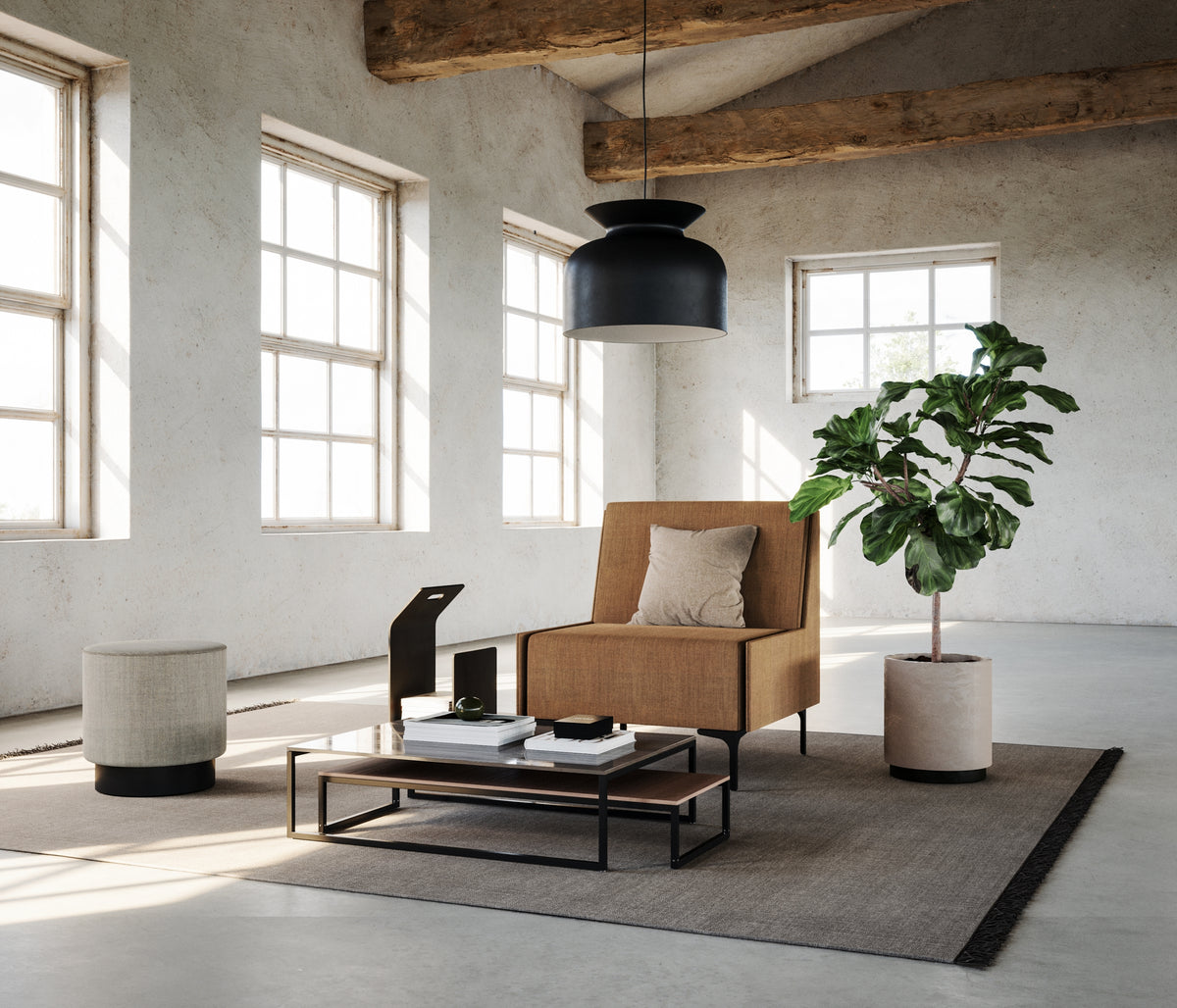 Focus modular sofa one-seater in tan upholstery in a loft room with large windows