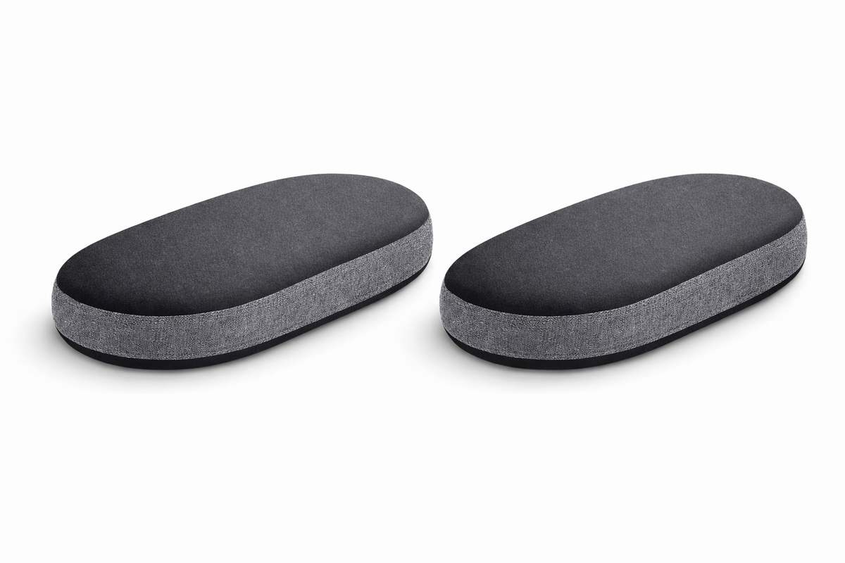 Pair of grey fabric armrest cushions shown side by side