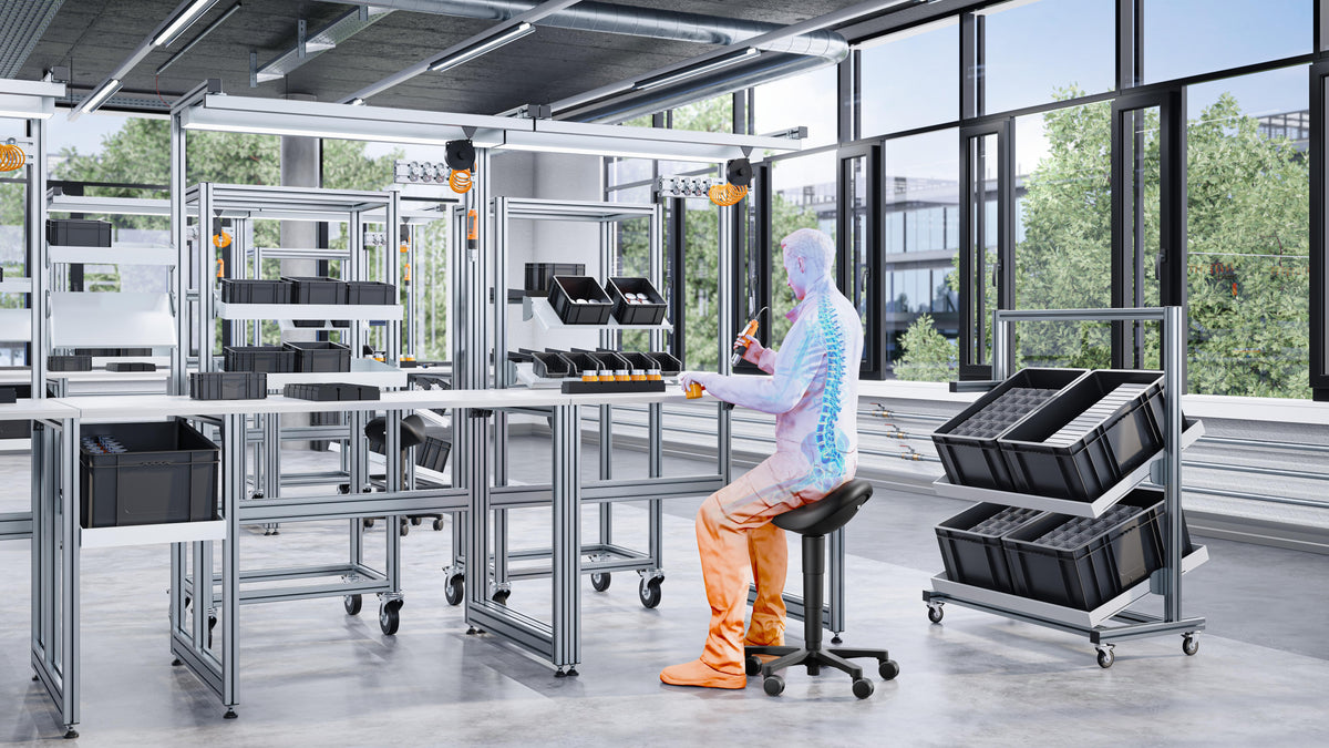 Visualisation of a cleanroom with black saddle chairs at workstations