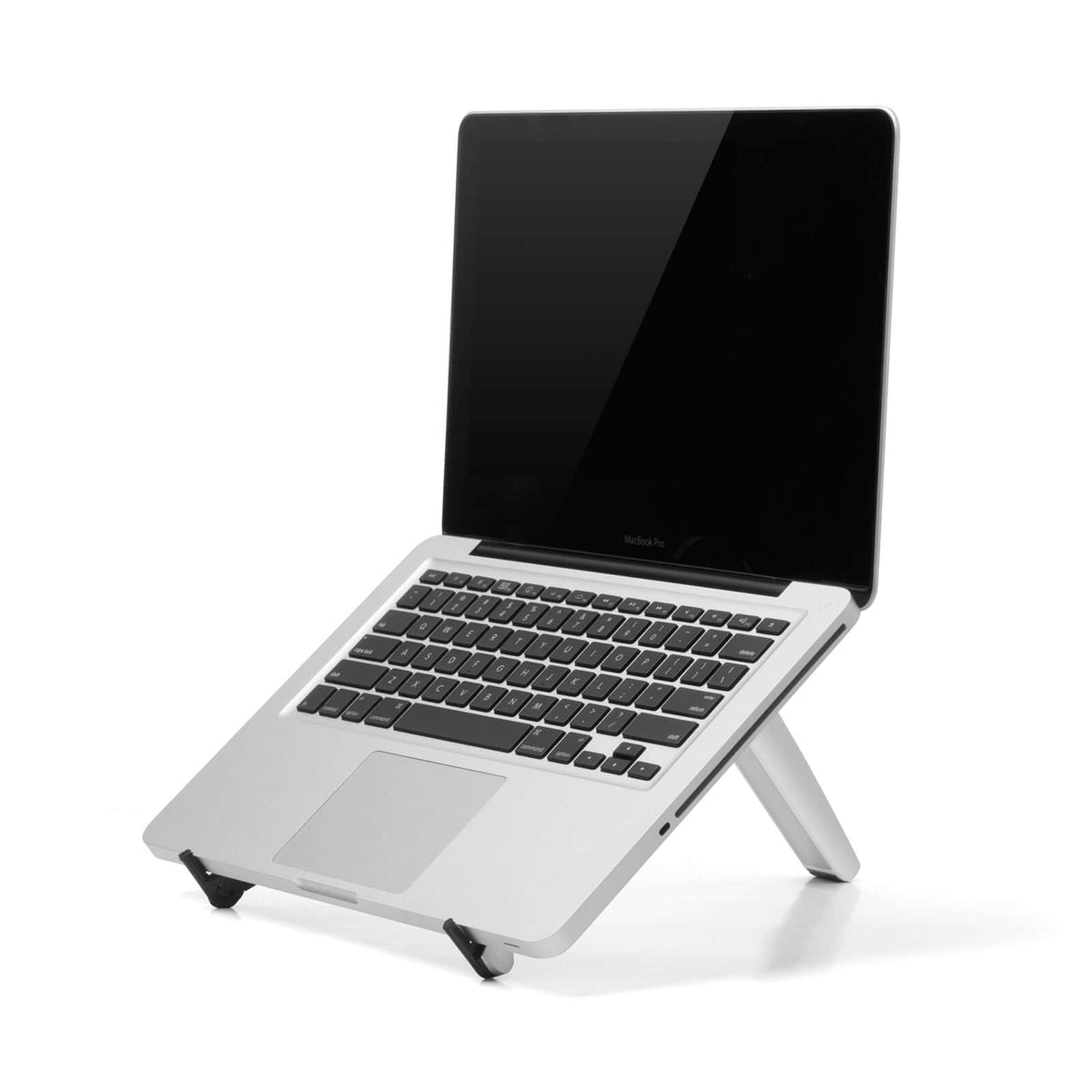 White Spider laptop and tablet stand supporting a laptop, sleek ergonomic design for efficient workspace setup.