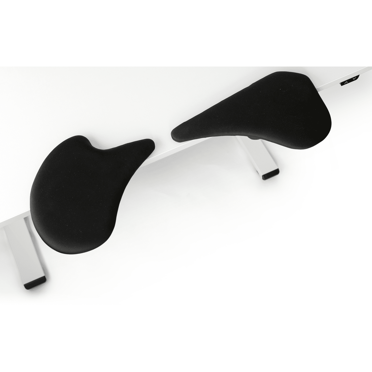 Ergonomic black 2-part arm support in faux leather on white desk, compatible with popular keyboards and mice, customizable for comfort.