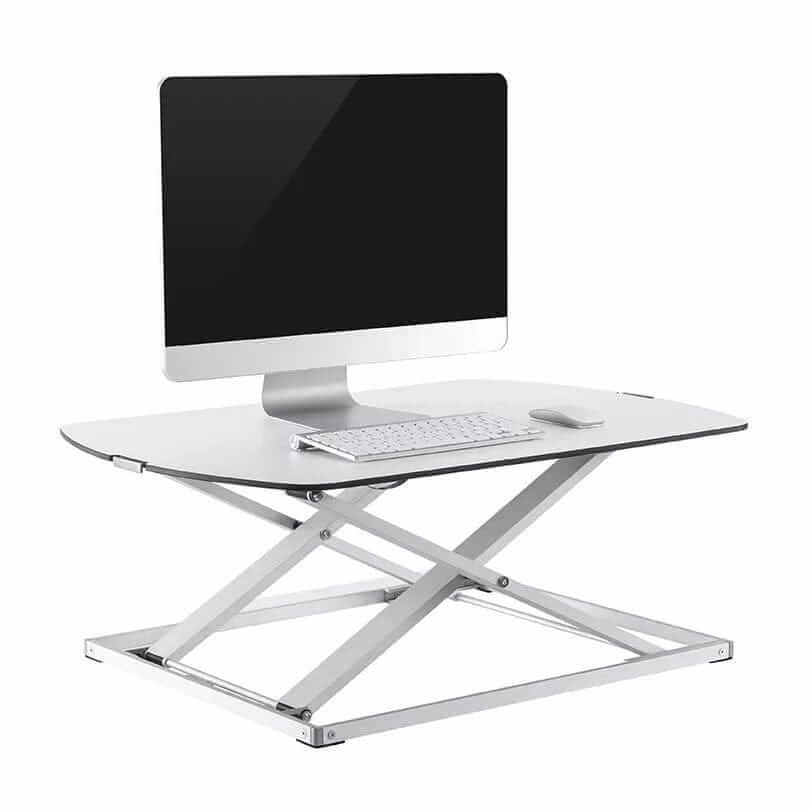 GetUpDesk Free tabletop raised with a monitor mounted on it