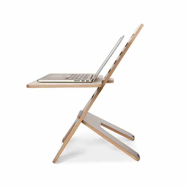 GetUpDesk Light wooden stand holding a laptop, seen from the side