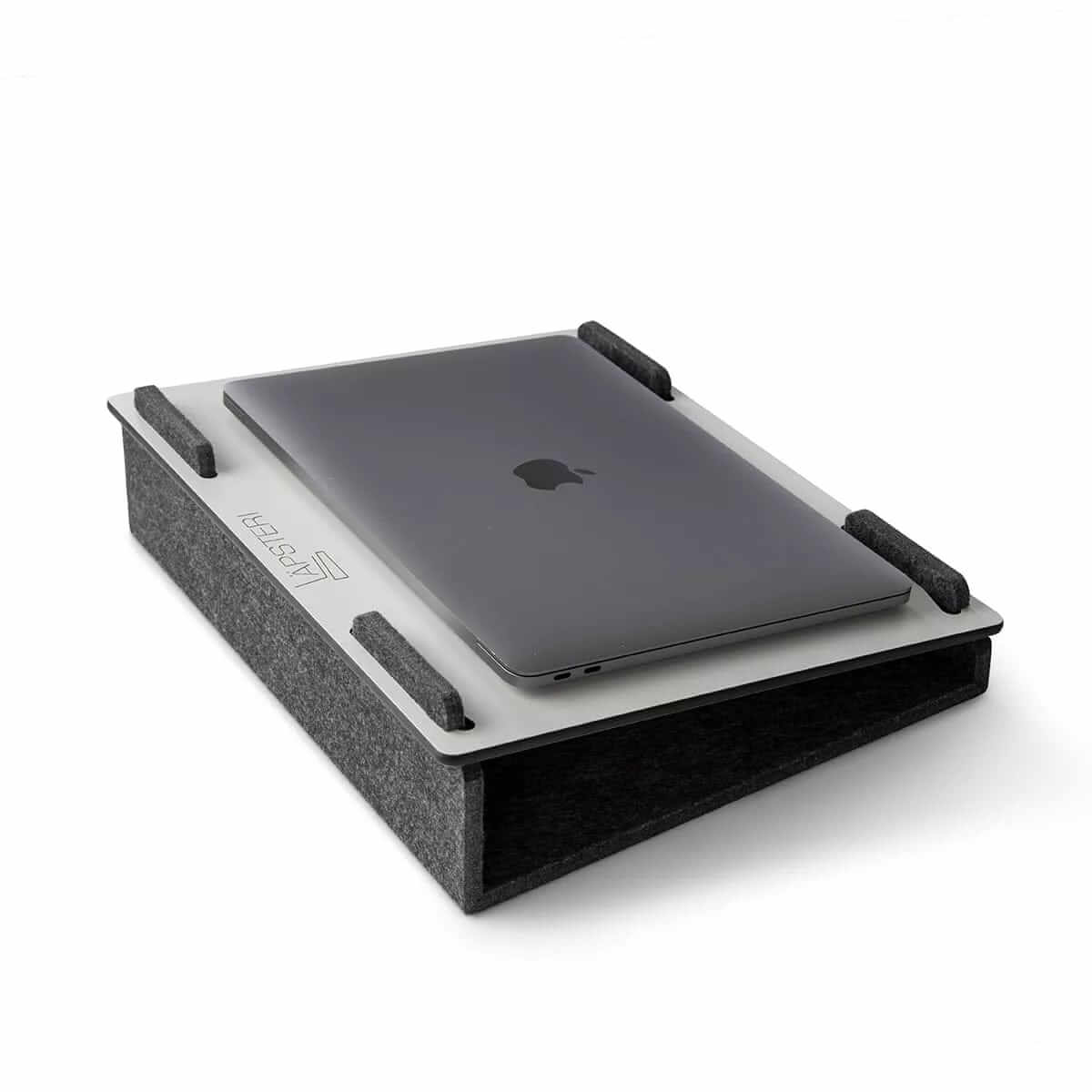 Lapsteri laptop stand holding a closed laptop, viewed at an angle