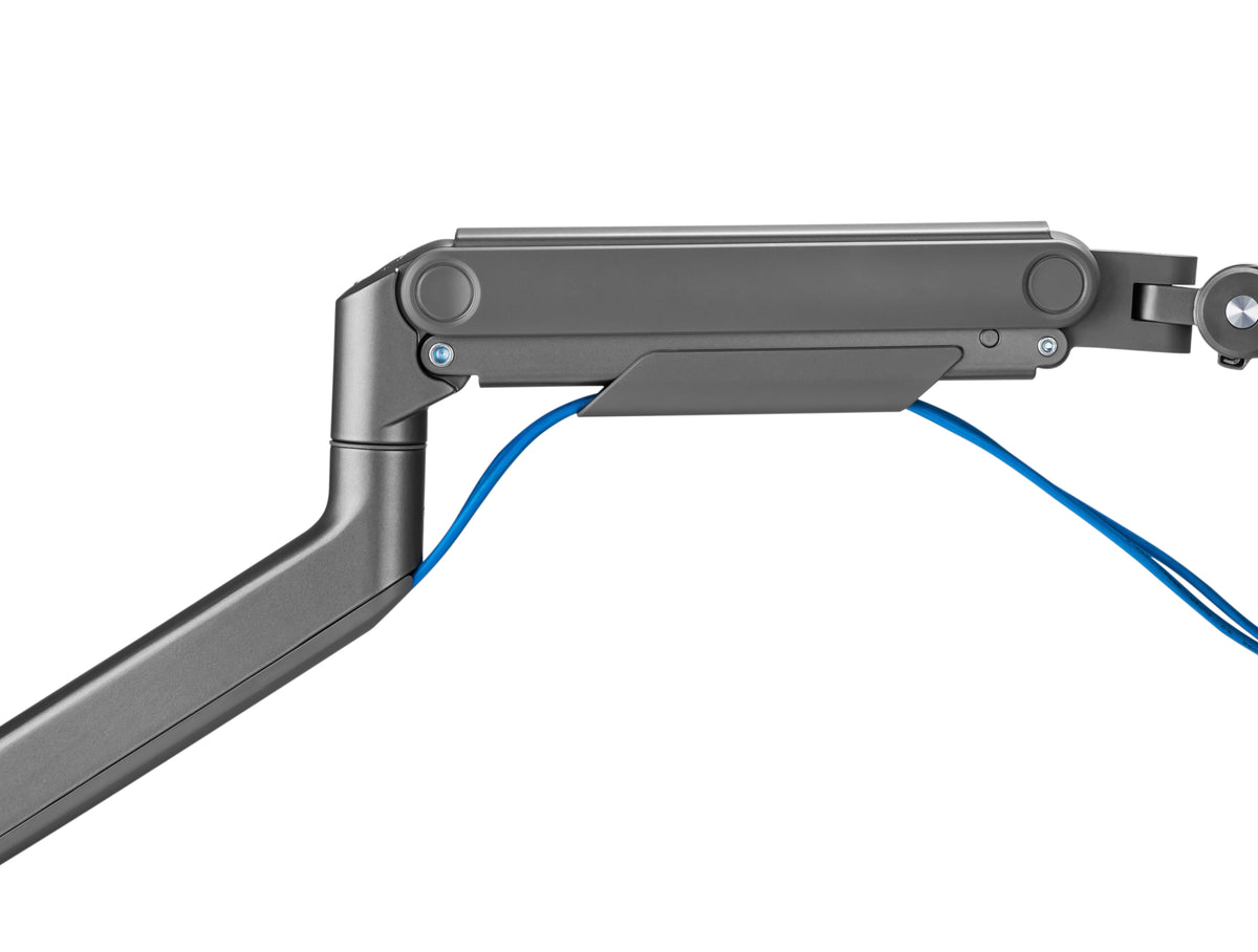 Close-up of the heavy duty monitor arm cable channel with a blue cable routed through