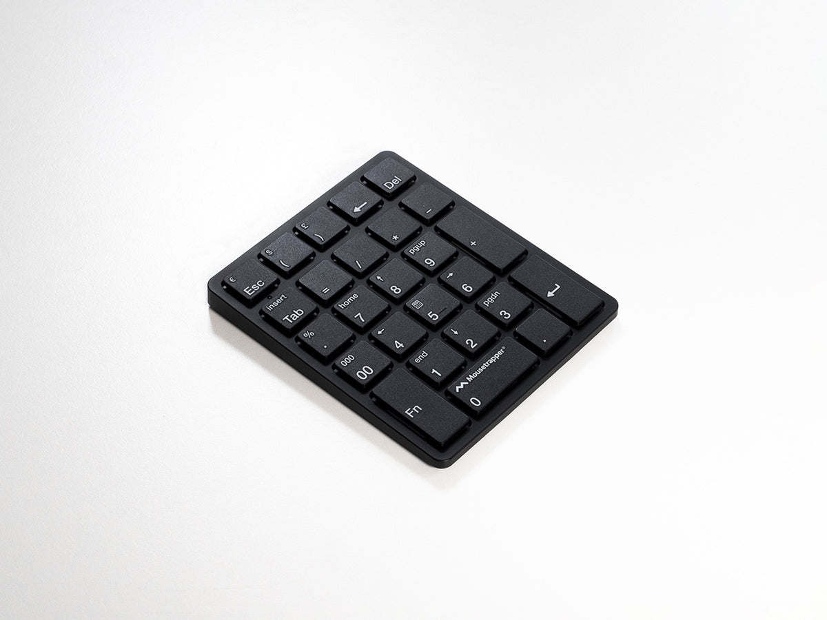 Black numeric keypad viewed at an angle from above