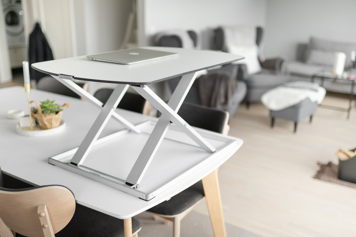 GetUpDesk Free adjustable tabletop on a table in an open-plan office