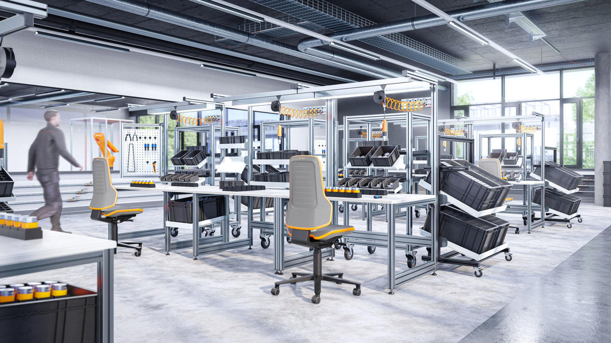 Production hall with a Neon 3 work chair at a workstation