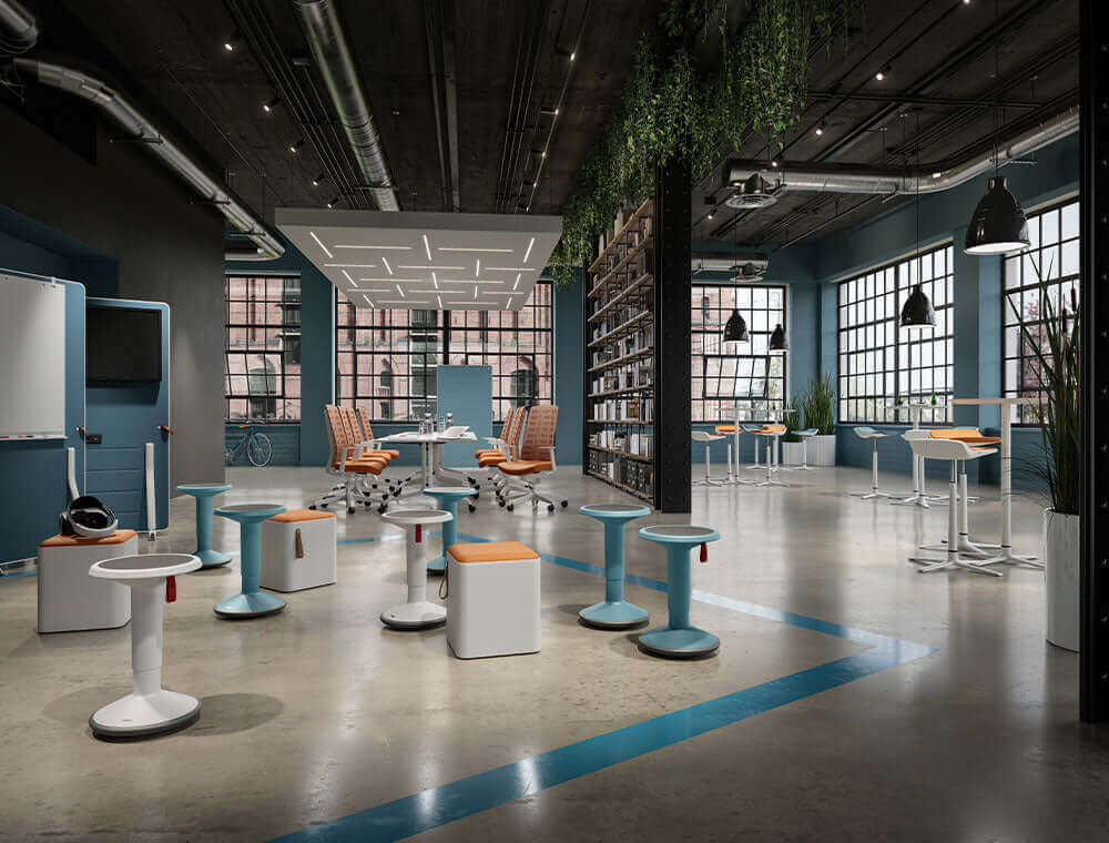 Open-plan office with UPis1 Junior stools among hanging plants