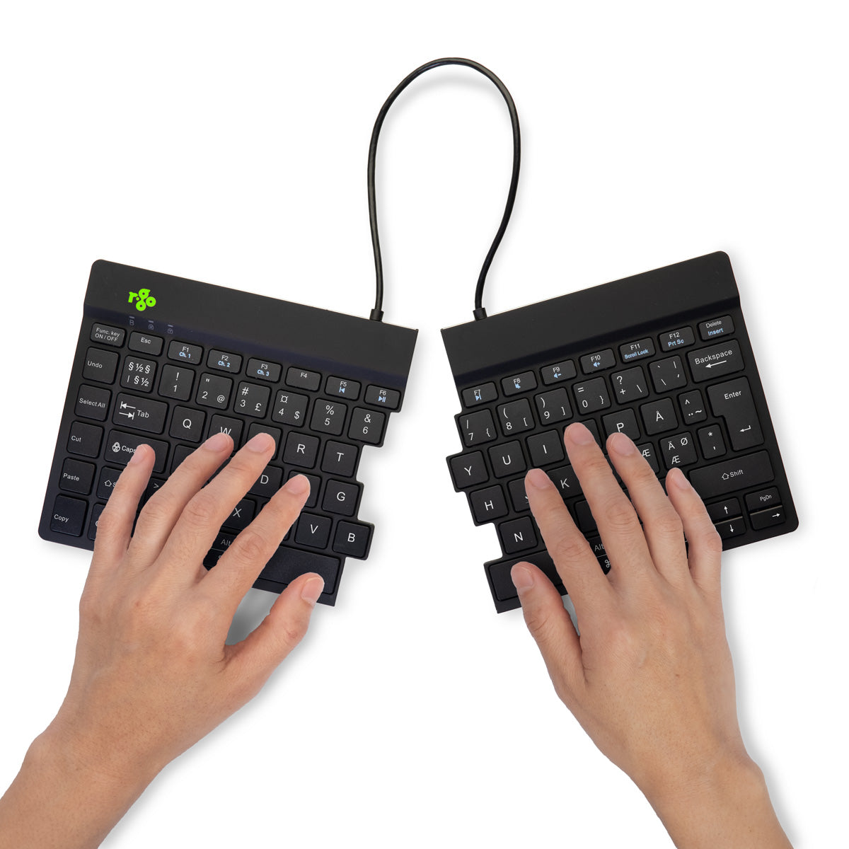 Hands typing on the two halves of an Ergo-R split keyboard, seen from above