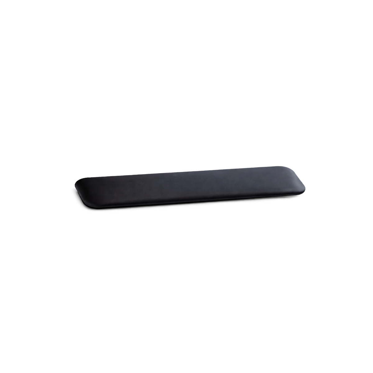 ErgoFinland wrist rest in black faux leather, shown at an angle