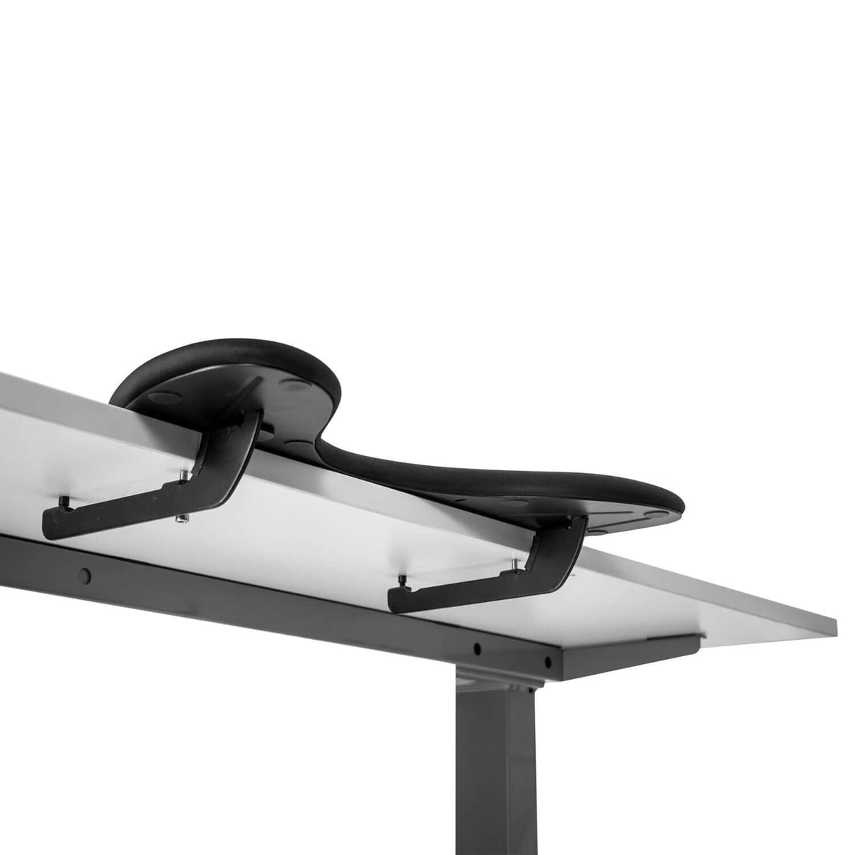 Arm support small shown clamped to the edge of a desk