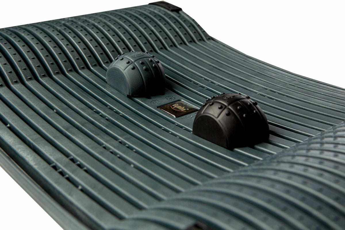 Graphite activation board with textured surface and ergonomic design for enhanced movement and improved workplace health.