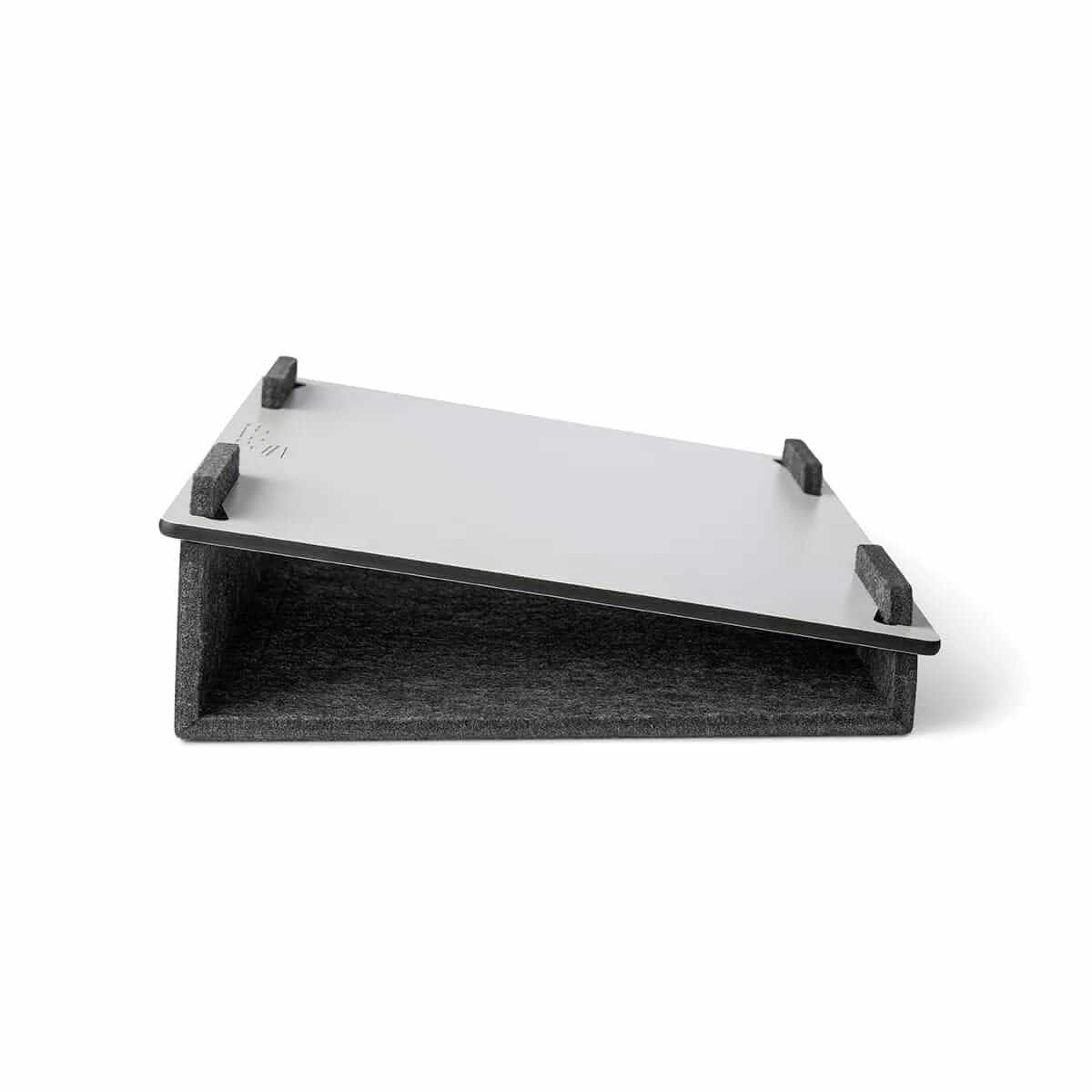 Lapsteri laptop stand viewed from the side, showing the cushioned underside